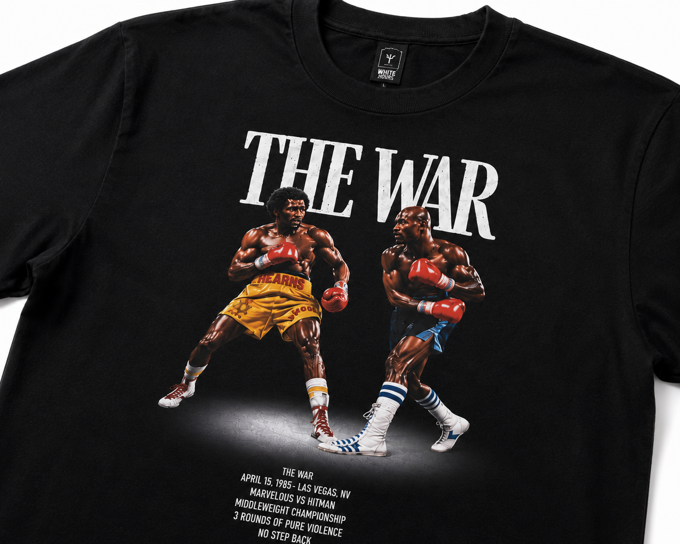 Close-up of The War boxing graphic on black cotton